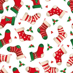 Cute seamless pattern with red socks in flat style isolated on white background for Christmas and New Year holiday.