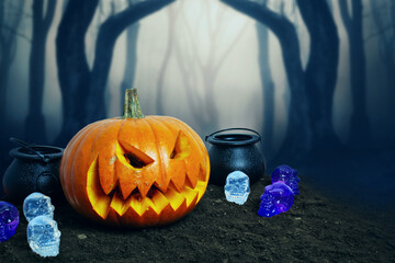 Halloween's background with a Halloween pumpkin, cauldrons, and creepy skulls in a forest with fog.