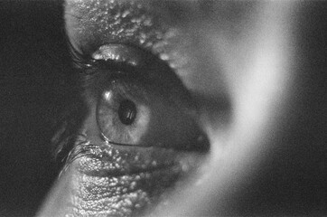 Looking Eye Grainy Black-White Film Close-Up