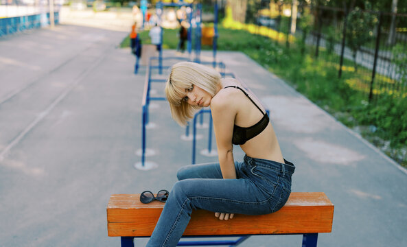 blond young woman on the sport ground 
