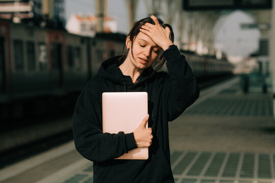 Young woman on the train station