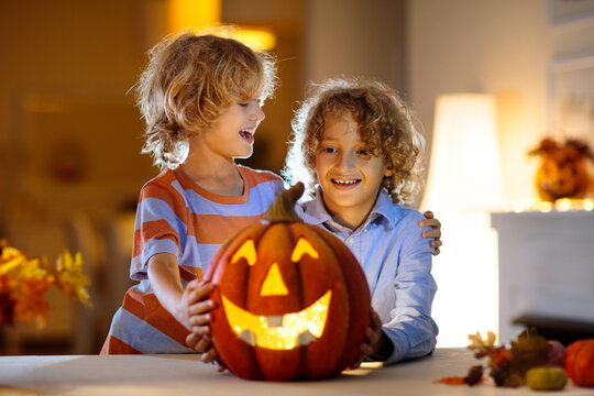 Family Carving Pumpkin For Halloween