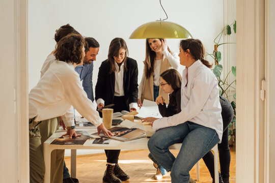 Team of Architects Working on Project Together
