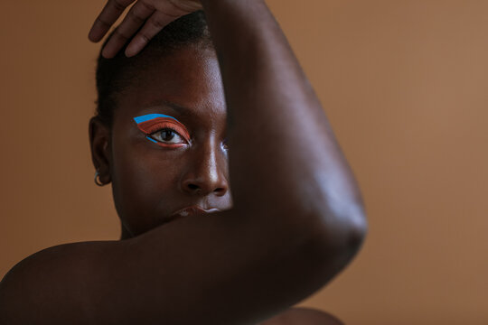 Model Posing With Colourful Make Up