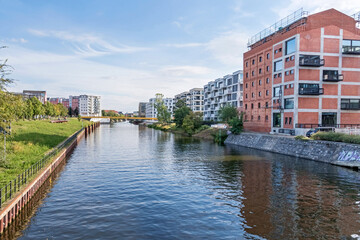Berlin-Spandau shipping canal and the the new Quarter at Nordhafen harbor in Berlin, Germany