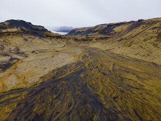 Nice aerial landscape road and field with moss clouds and mountain