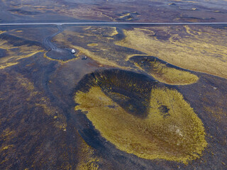 Aerial shot, Nice landscape of mountains and rivers with mossy field in iceland