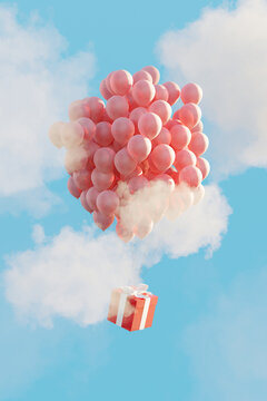 Red gift floating in sky attached to red balloons