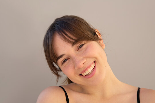 Happy woman with innocent expression