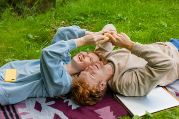couple taking a selfie and laughing