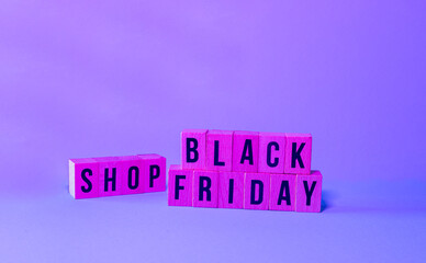 sign with wooden lettering indicating Black Fridey's bargain Black Fridey's Shop
