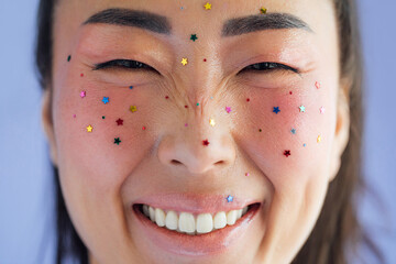 Beautiful Woman with Glitters on Her Face