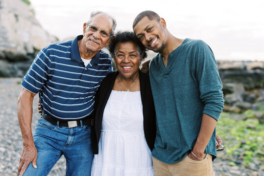 A Mother With Her Husband And Adult Son