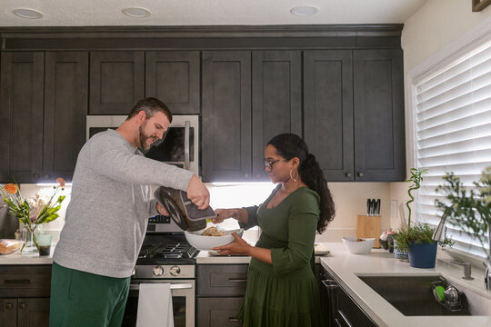 Mixed Couple Cooking Together