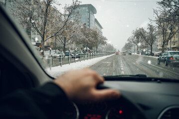 Drivers point of view while driving in the city