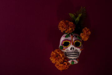 Dia De Los Muertos or Day of the Dead Celebration Banner with Empty Space. Low key photo of Scull Decorated with Marigold flower. Mexican Festive.