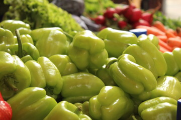 Colored fruits and vegetables at a grocery store. New season foods