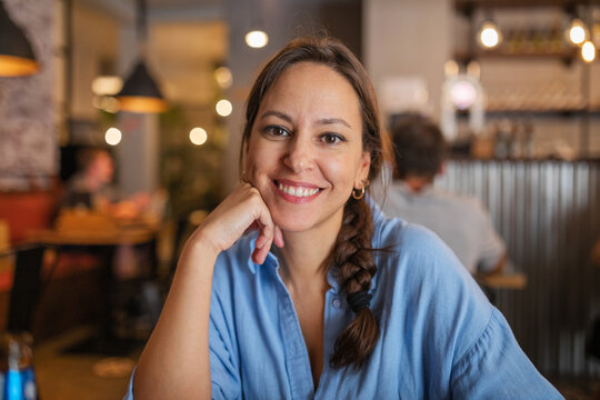 Young Caucasian Woman In Restaurant