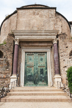 A green bronze door at the roman forum