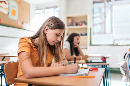 Girl taking notes