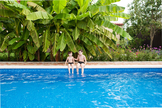Two brothers in the pool