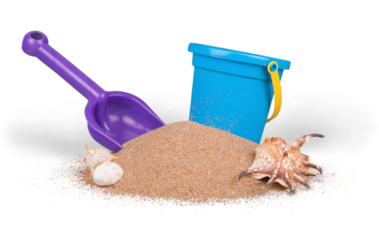 Shot of the beach on a sunny day, with a spade and bucket