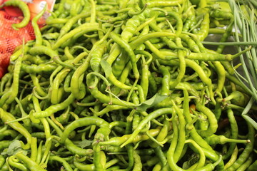 Colored fruits and vegetables at a grocery store. New season foods