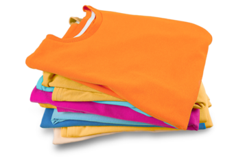 Stack of folded garments. Closeup over white background.