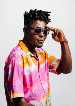 Cheerful black man in trendy outfit