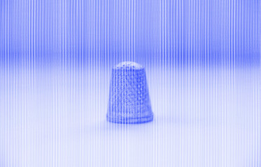 Thimble with fine thread-like pencil lines