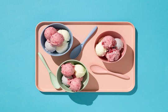 Vanilla and raspberry ice cream dessert in bowls