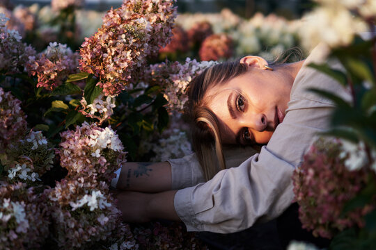 portrait of a girl among flowers