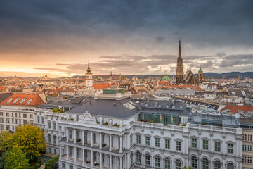 St. Stephen's Cathedral and Vienna old town cityscape at dramatic sky, Austria