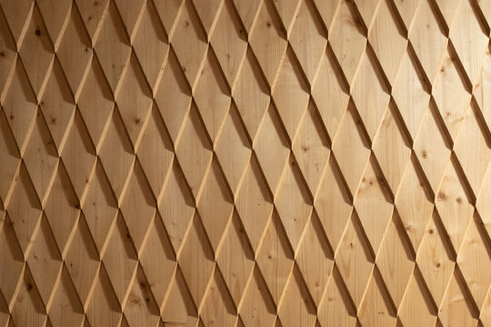 Closeup view at timber wall with many geometric parts