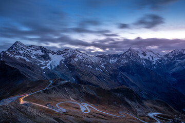 Grossglockner road and dramatic mountain range landscape at dawn, Austria alps