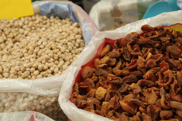 Legumes in big nylon bags in a shop
