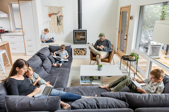 Family Quiet Time In Living Room