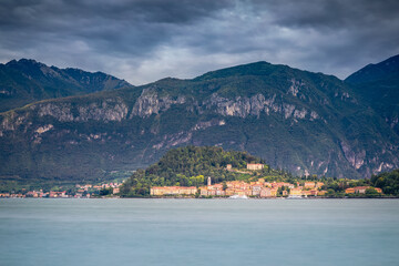 Fototapeta premium Mountains and Bellagio skyline, view from Lake Como at sunset, northern Italy
