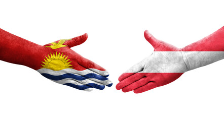 Handshake between Austria and Kiribati flags painted on hands, isolated transparent image.