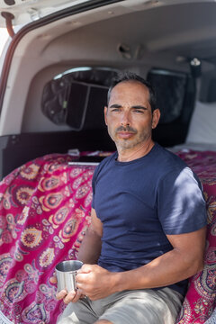 young man in camper van