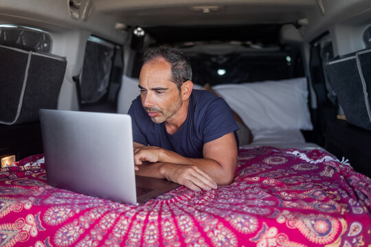 young man in camper van