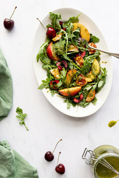 late summer stone fruit and arugula salad