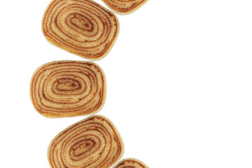 Several slices of bolo de rolo (roll cake) forming a semi circle_top view (PNG).