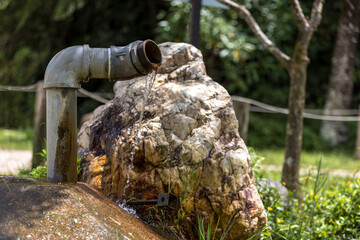 Water pipes with water coming out all the time.
