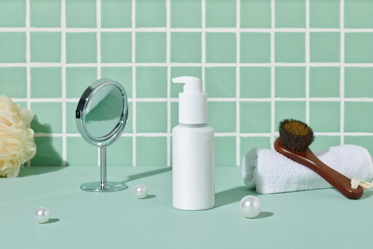 A mirror and beauty products on sunlit bathroom table