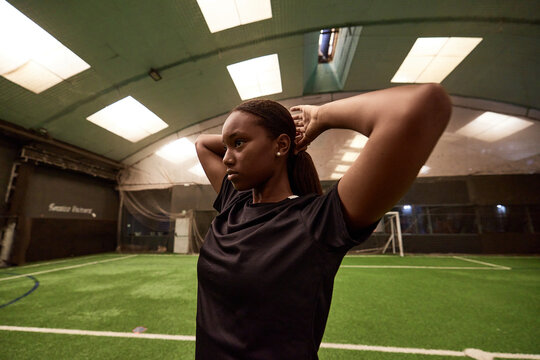 Female football player on pitch