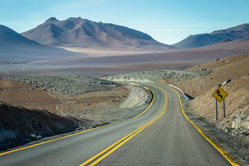 Dirt road in Atacama desert, volcanic arid landscape in Chile, South America