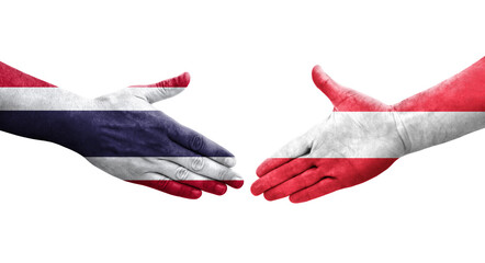 Handshake between Austria and Thailand flags painted on hands, isolated transparent image.