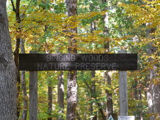 sign in the forest singing woods nature preserve