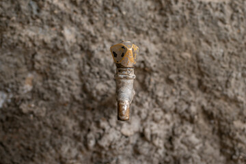 Grunge Metal Water Faucet. Rusted iron water tap.